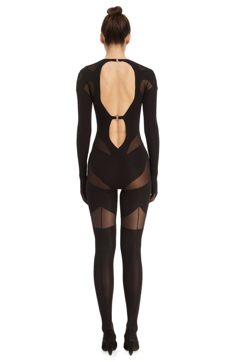 Full body catsuit made of extra soft eco-performance fabric that gives the feeling of a second skin. Opaque and sheer panels, open back with gold clasps at neck and mid-back